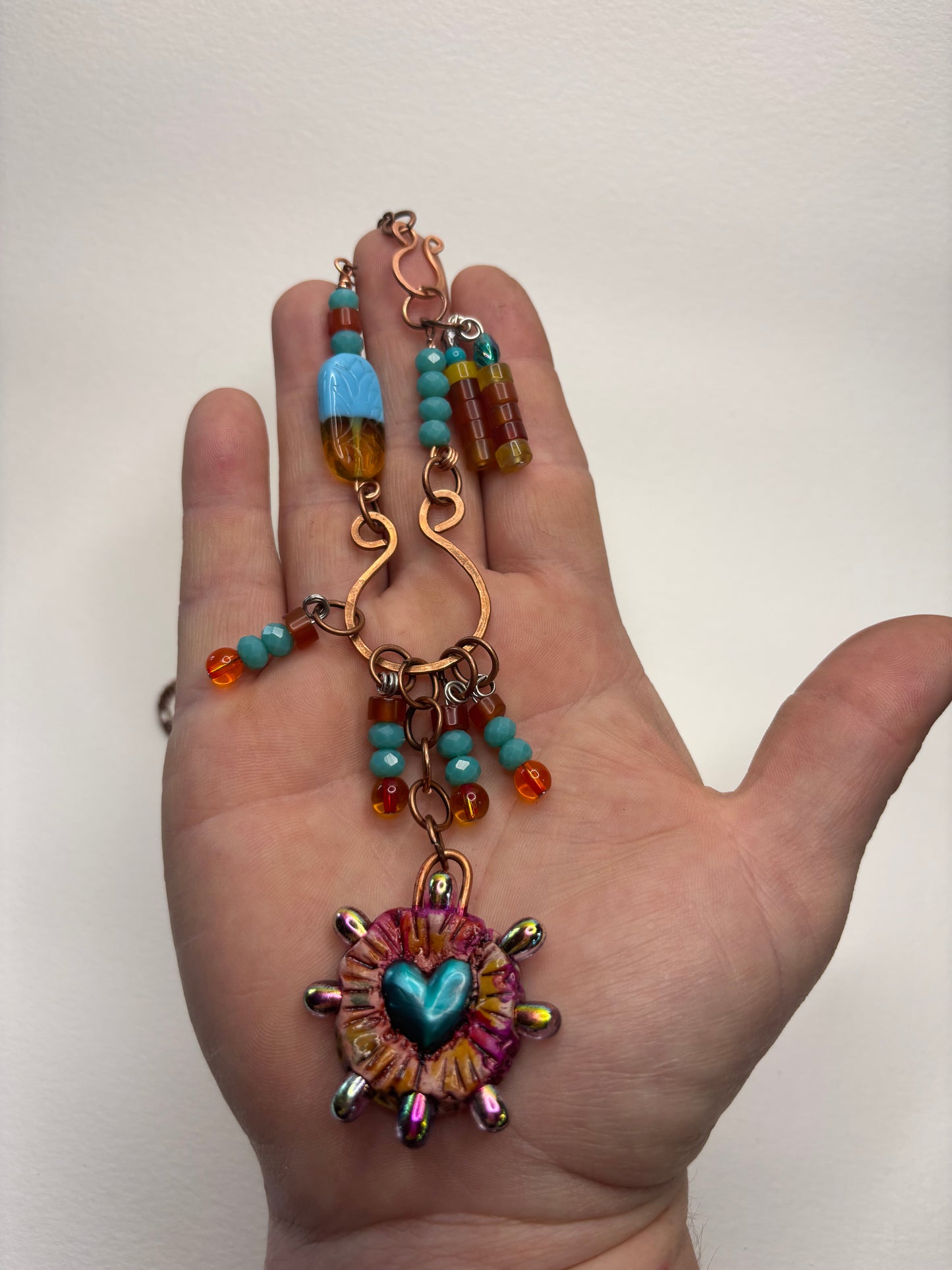 Heart Hanging on a Copper Loop Necklace